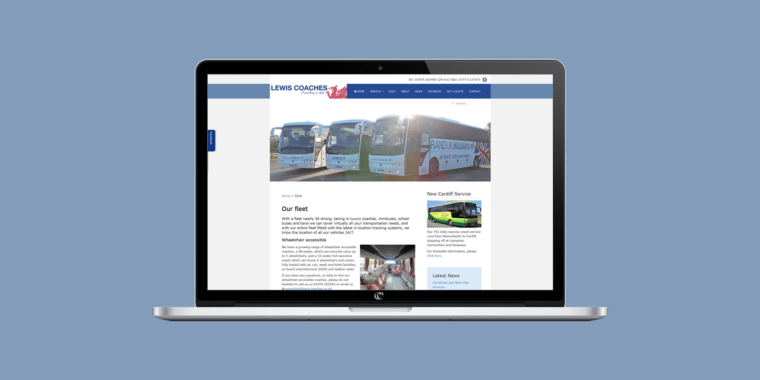 Lewis Coaches updated website design by create/enable on a laptop.